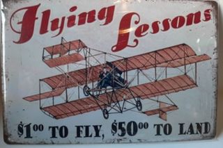 Flying Lessons Tin Sign